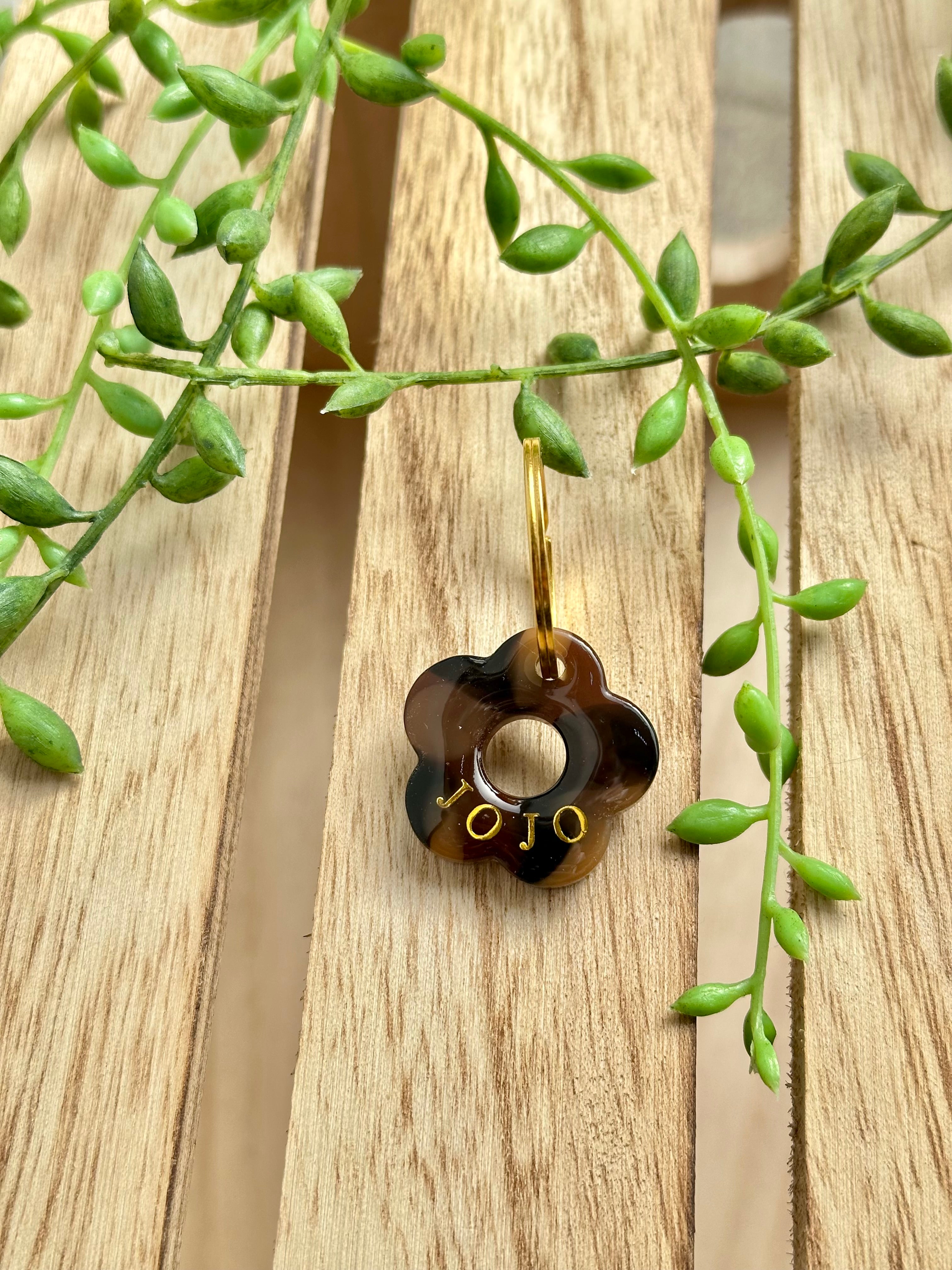 Médaille petite fleur jaguar