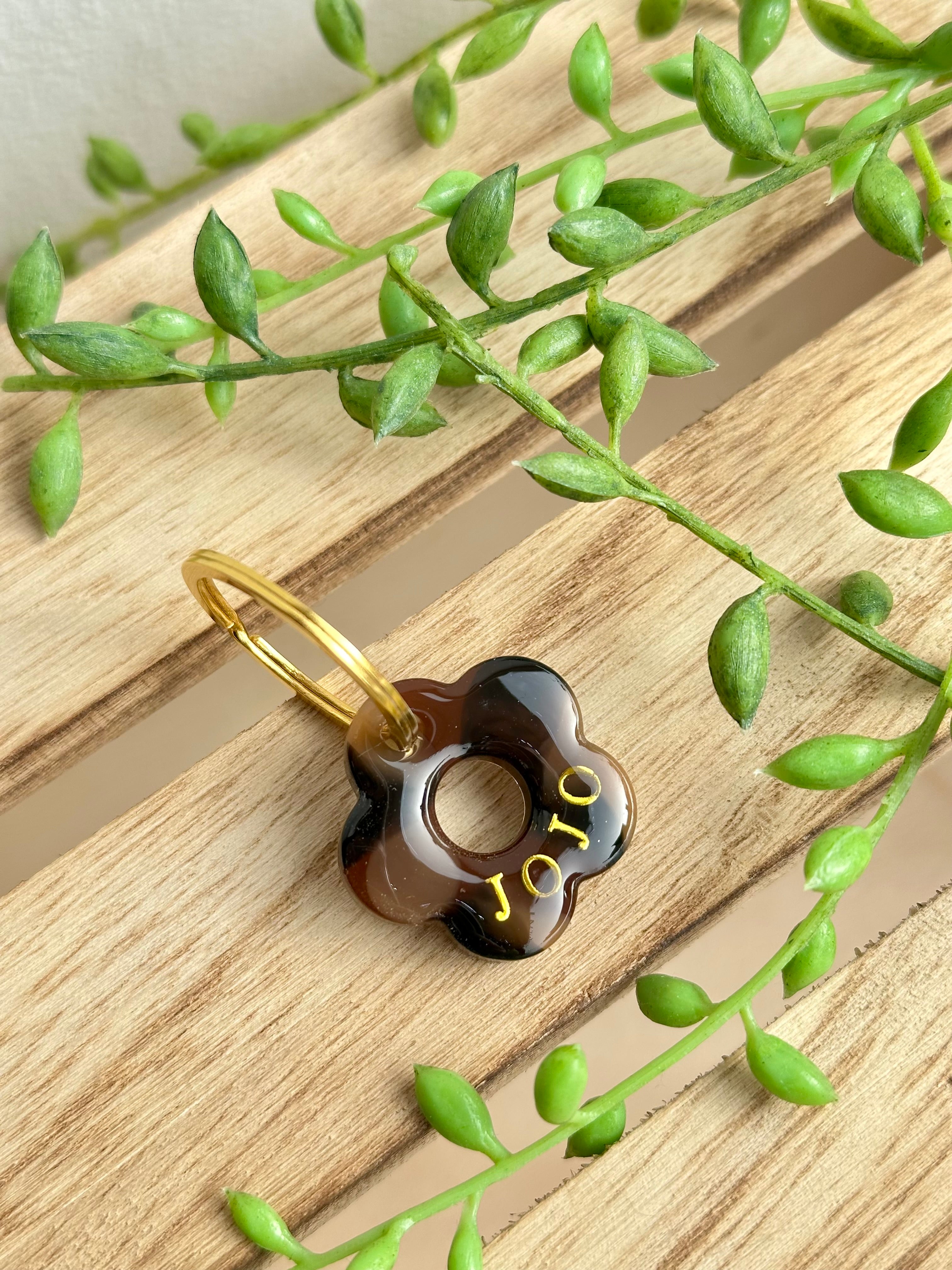 Médaille petite fleur jaguar